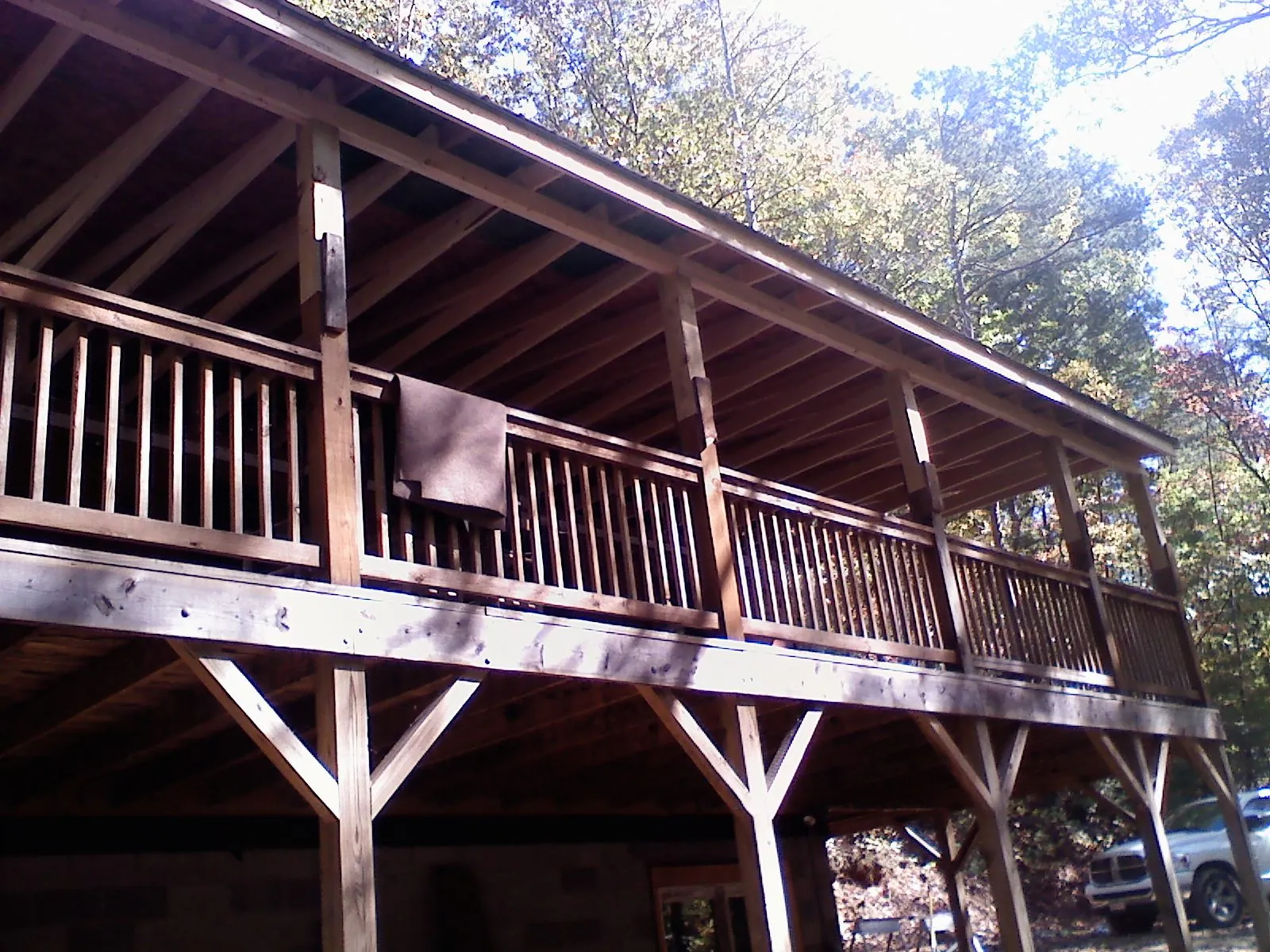 Timber framing under a new elevated porch and deck — Roof Leak Repair in Islip Terrace by Roofing Brothers